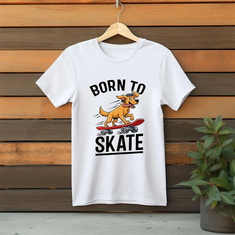 White t-shirt with 'Born to Skate' graphic on a wooden background
