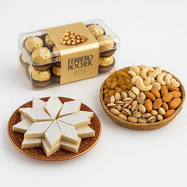 Ferrero Rocher chocolate box, kaju katli sweets, and dry fruits in gift combo on white background.