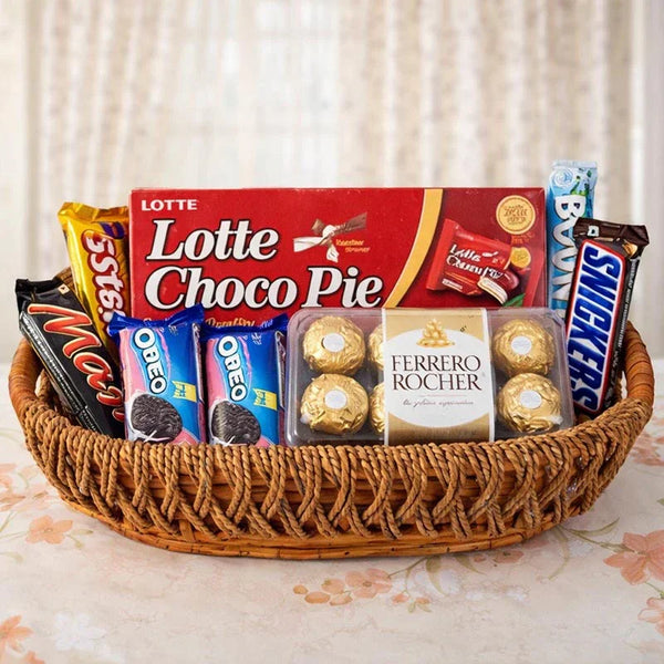 Gift basket with assorted chocolates, Choco Pie, Oreo, Ferrero Rocher, and Mars bars