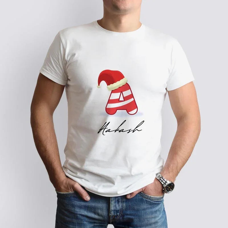 Person wearing a white t-shirt with a red and white striped hat graphic and 'Makash' text on a plain background