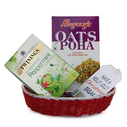 Gift basket with Bagrry's oats poha, Twinings peppermint tea, and Christmas card