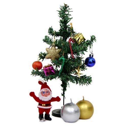 Mini Christmas tree with colorful ornaments, Santa figurine, silver and gold baubles