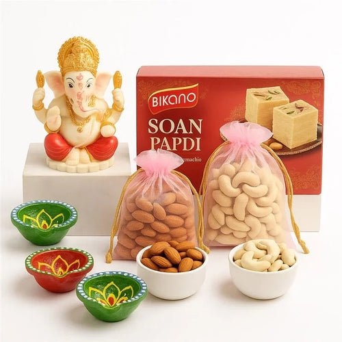 Diwali Ganesha Idol Gift Combo with Diyas, Soan Papdi, Almonds and Cashews Online Gift Delivery