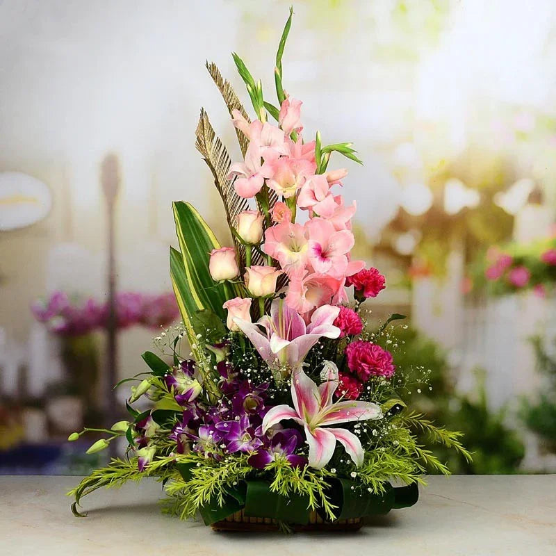 Colorful flower arrangement with pink and white flowers on a blurred background