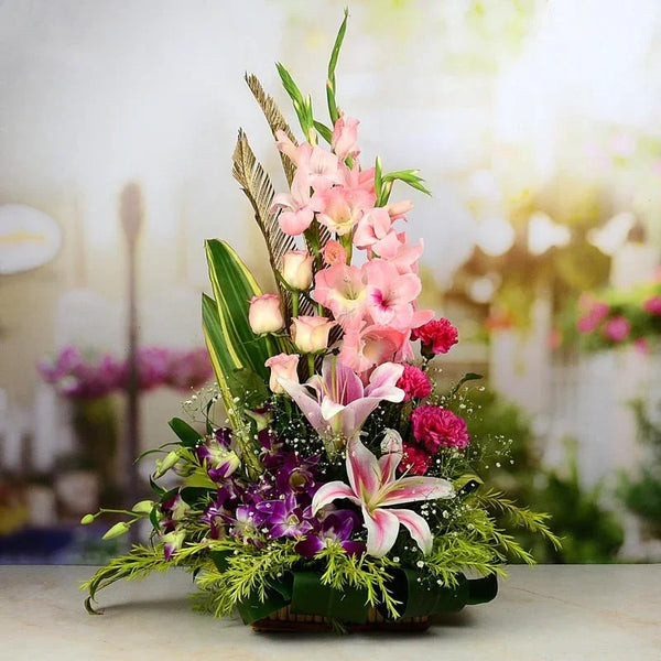 Colorful flower arrangement with pink and white flowers on a blurred background