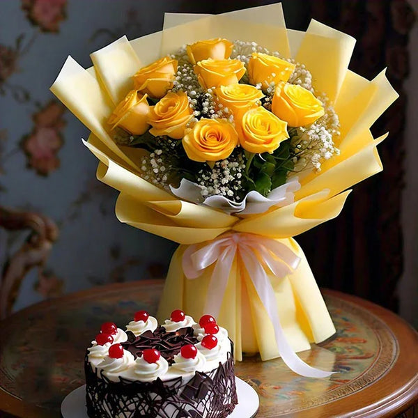 Yellow rose bouquet with white baby's breath and chocolate cake topped with cherries on a table