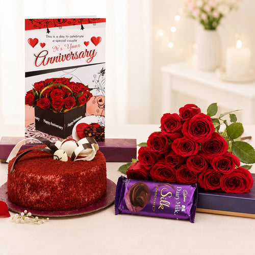 Red velvet cake, bouquet of red roses, and Cadbury Silk chocolate on a decorative background.