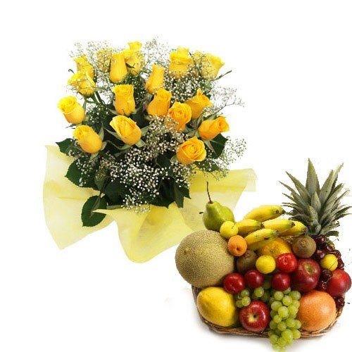 Yellow rose bouquet with assorted fresh fruits in a basket, ideal gift set for celebrations
