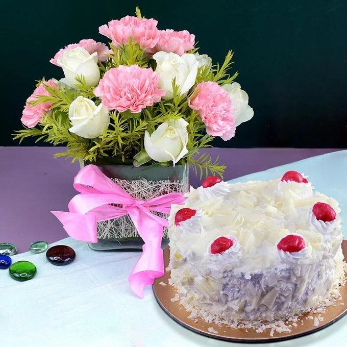 Pretty Flowers and White Forest Cake - Flower Delivery in Kalyani