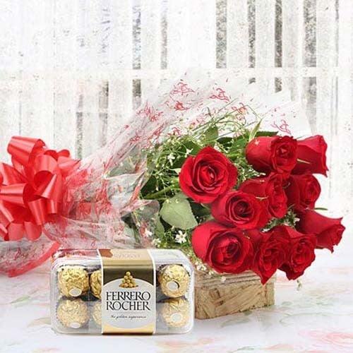 Bouquet of red roses with greenery and Ferrero Rocher chocolates, perfect for gifting