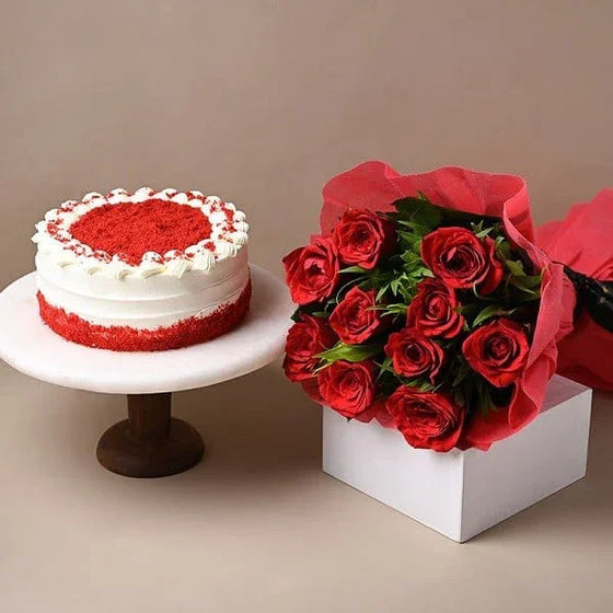 Red velvet cake with white cream and a bouquet of red roses, perfect for gifting