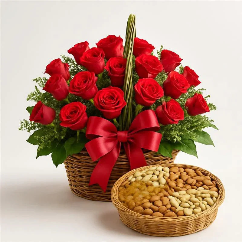 Basket of red roses with a red bow and a smaller basket of nuts on a light background