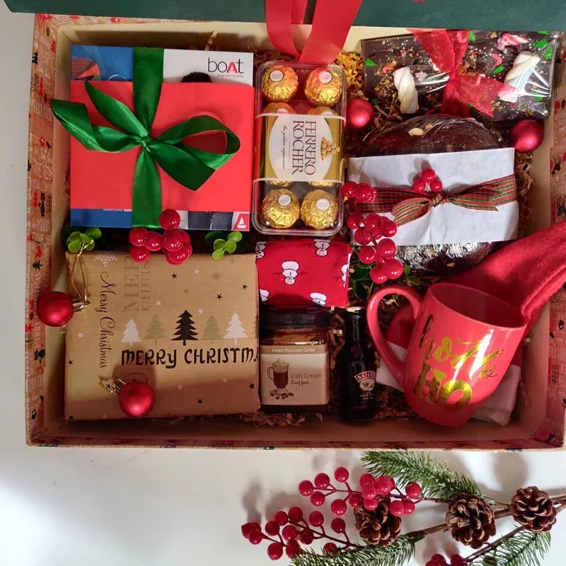 Christmas-themed gift box with festive decorations and treats.