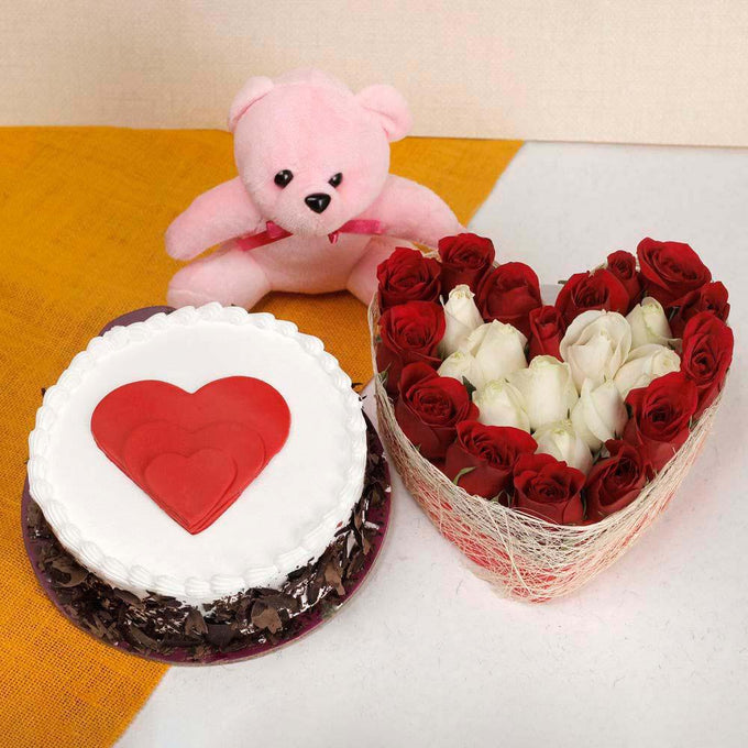 Heart Shape Red & White Rose Arrangement with Half Kg Black Forest Cake & Pink Teddy - Flower Delivery in GiftsGhaziabad