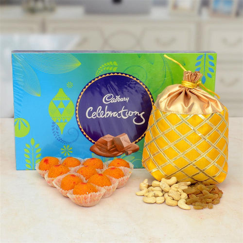 Cadbury Celebrations chocolate box with a dry fruits bag and laddu 