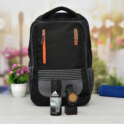 Black backpack with orange zipper, Adidas deodorant, watch, and plant 