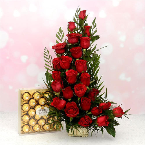 Bouquet of red roses with a box of Ferrero Rocher chocolates