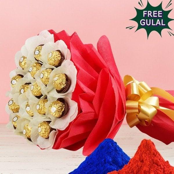 Bouquet of Ferrero Rocher chocolates wrapped in free gulal with a gold bow 