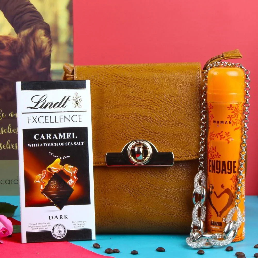 Brown leather handbag with a chain strap, Lindt chocolate bar, and perfume bottle 