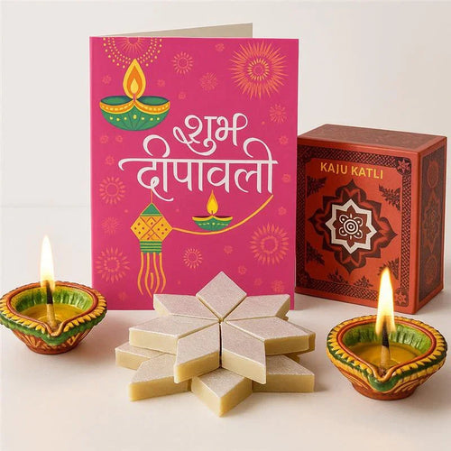 Diwali-themed card with decorative Diya and a box of Kaju Katli on a white background