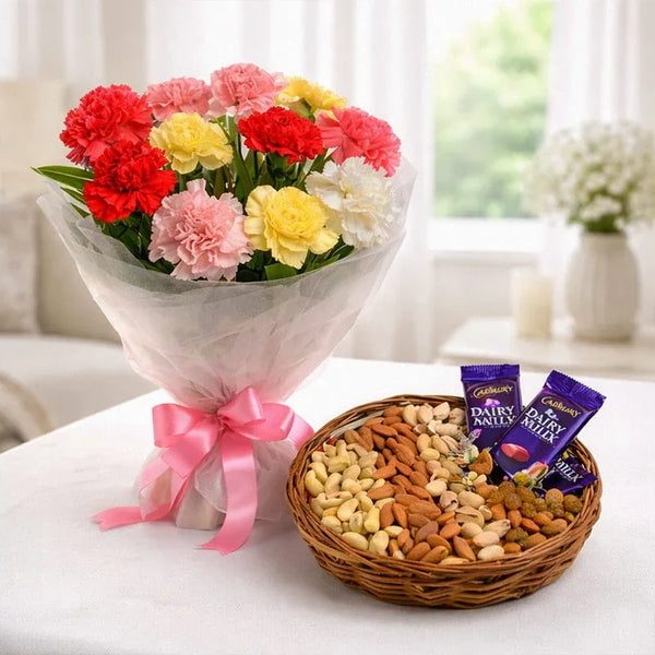 Bouquet of mixed carnations with a basket of assorted dry fruits and chocolate bars, gift set