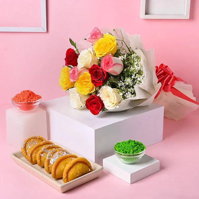 Bouquet of flowers with snacks on a pink background