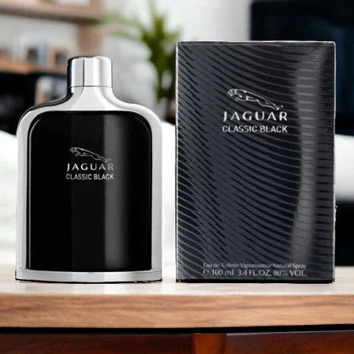 Jaguar Classic Black perfume bottle and packaging on a wooden surface.