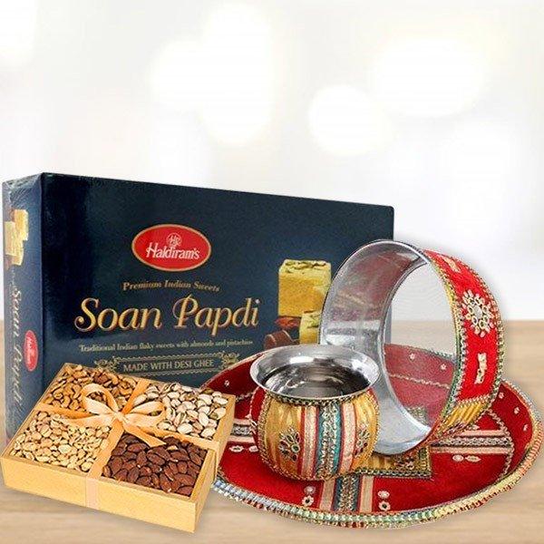 Haldiram's Soan Papdi box with a decorative plate and bowl 