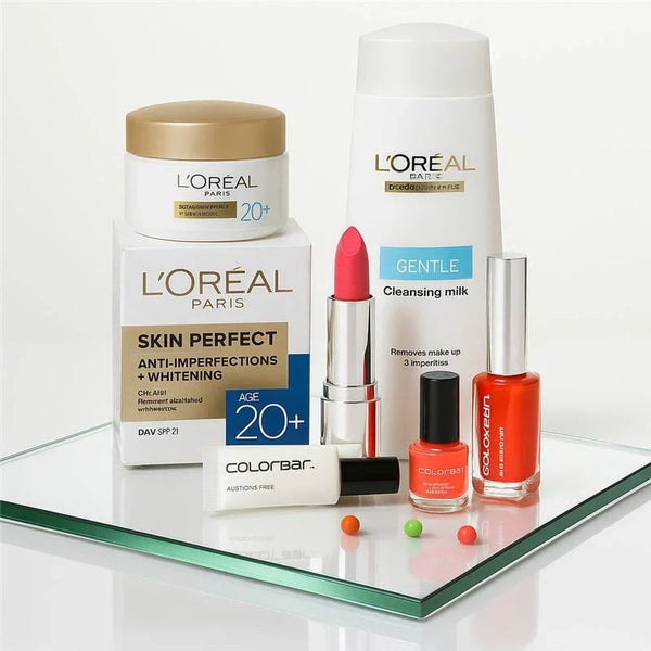 L'Oreal skincare and makeup products on a reflective surface with a white background