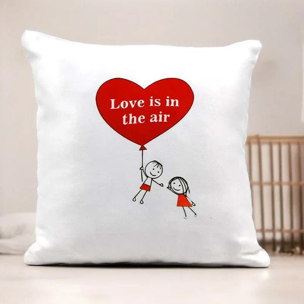 White personalized cushion with heart balloon, cartoon couple, 'Love is in the air' text