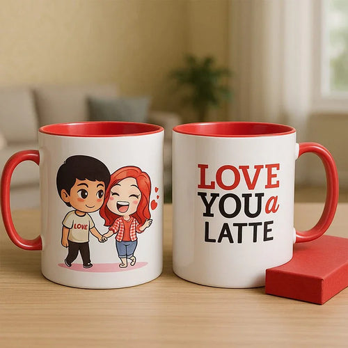 Two mugs with cartoon design and text on a wooden surface.