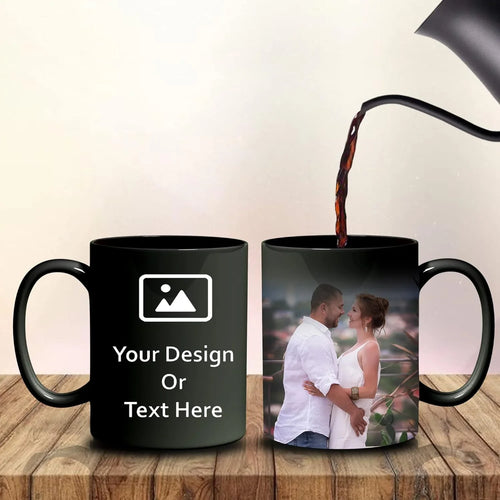 Black mug with customizable design on a wooden surface