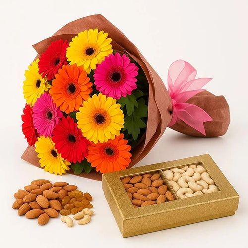 Colorful gerbera flower bouquet with a gift box of almonds, cashews and raisins.