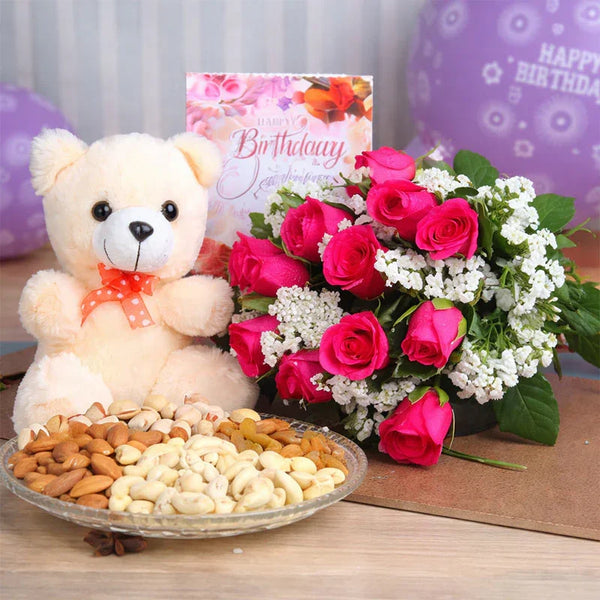 Birthday gift set with teddy bear, pink rose bouquet, dry fruits, and greeting card