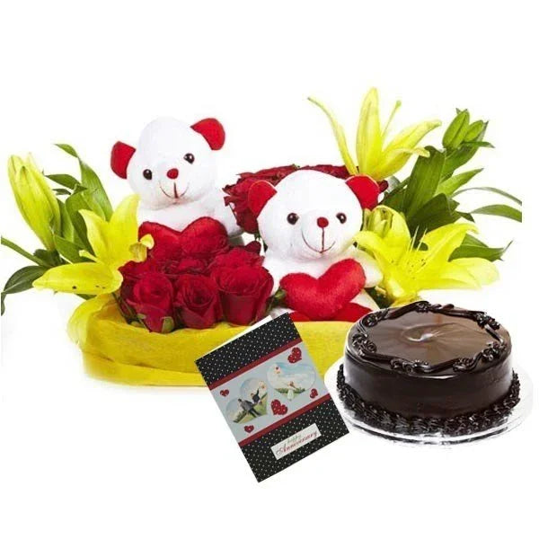 Gift set with two teddy bears, yellow lilies, red roses, chocolate cake, and greeting card