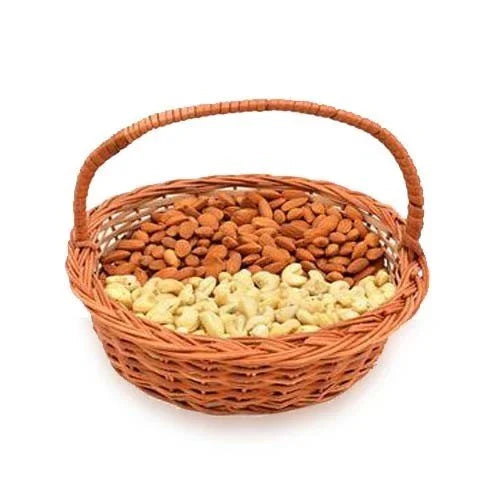Wicker basket filled with dry fruits, almonds and cashews, perfect for gifting