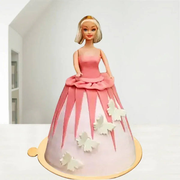 Barbie doll cake with pink gown on a white background