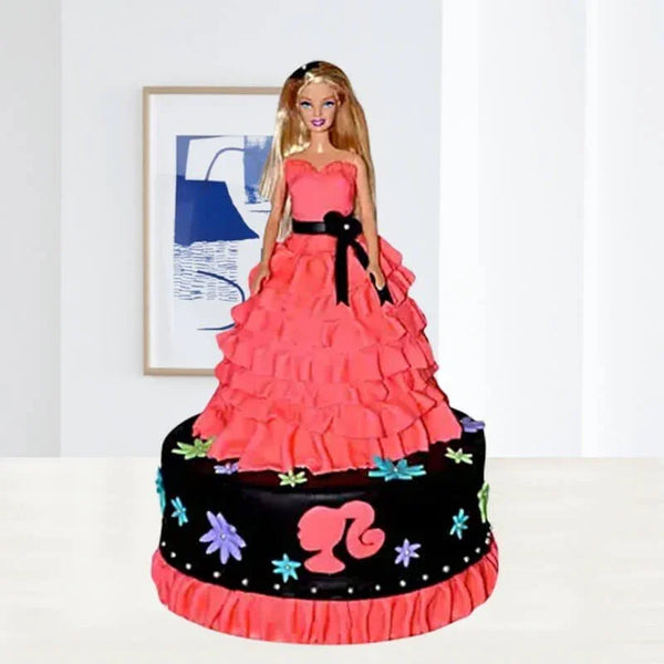 Barbie doll cake with a pink gown on a white background
