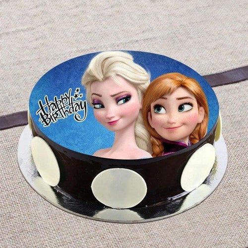 Birthday cake with animated characters on a textured surface