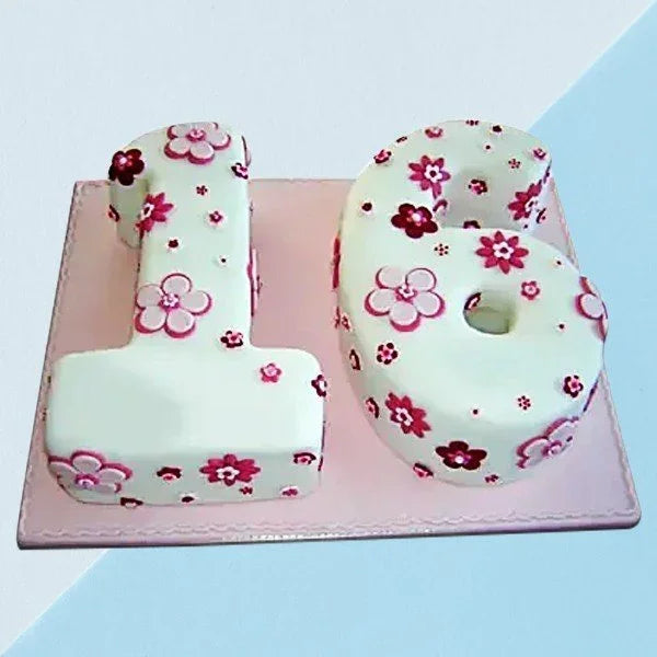 Floral-patterned number '18' cake on a pink base