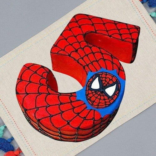 Number 5 shaped like Spider-Man's face on a fabric background