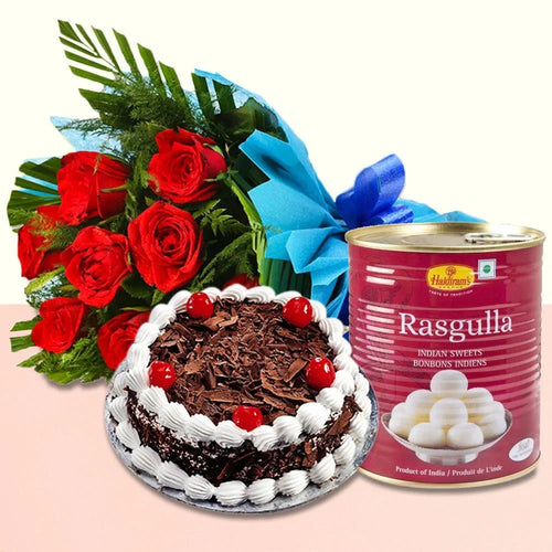 Chocolate cake with red cherries, bouquet of red roses, and can of Rasgulla 