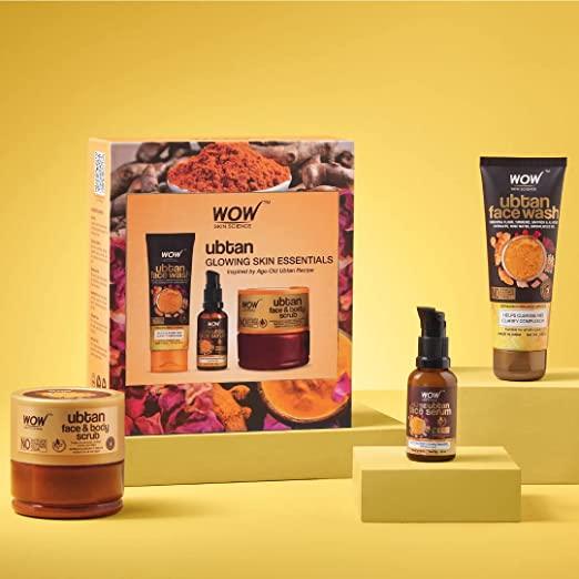 WOW ubtan glowing skin essentials gift set with face wash, serum, and body scrub on yellow background