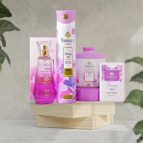 Yardley London product set including a bottle, box, and other items on a wooden stand with a light background.