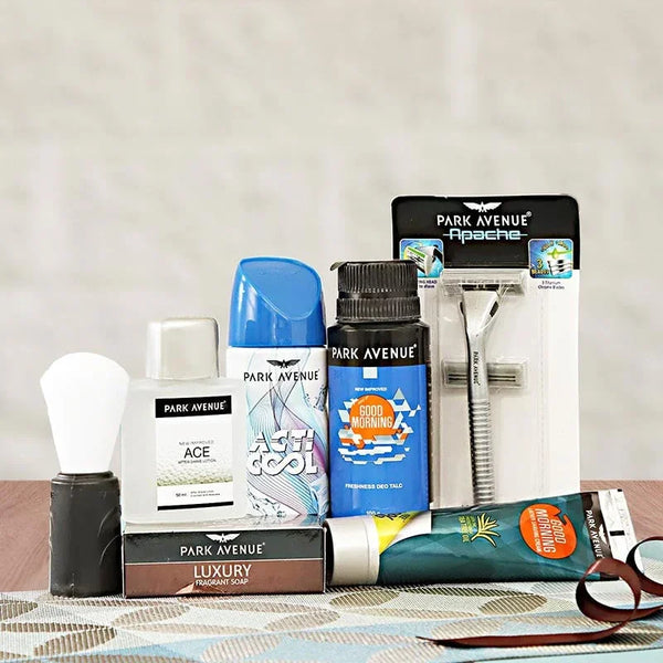 Men’s grooming gift set with shaving brush, razor, deodorant, soap, and face cream