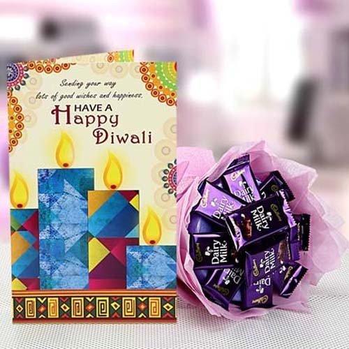 Diwali card with colorful candles and a bouquet of Cadbury Dairy Milk chocolates.