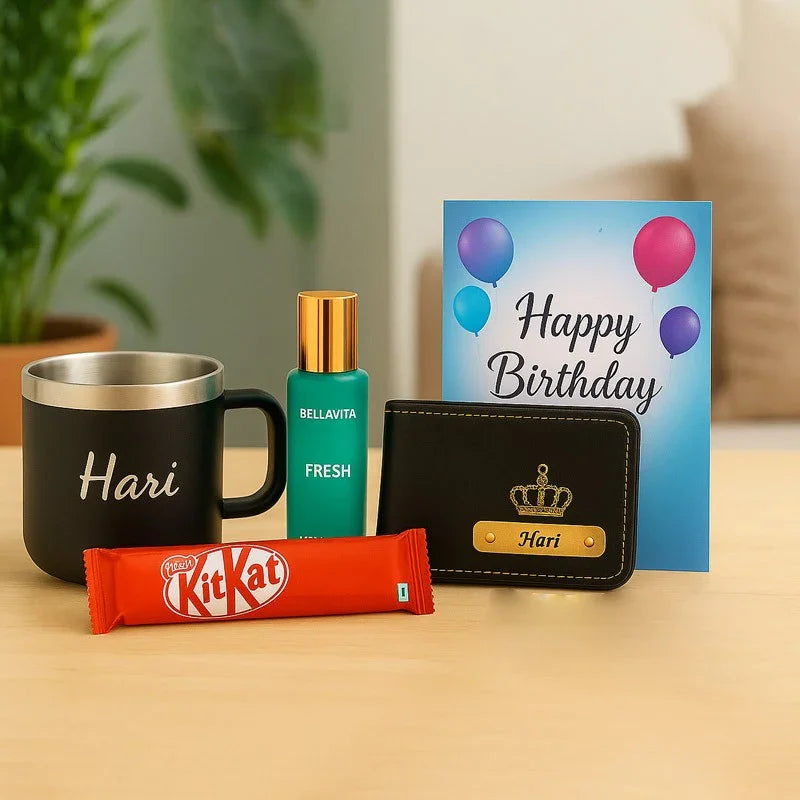 Gift set with mug, perfume, wallet, and KitKat bar on a table with a 'Happy Birthday' card in the background.