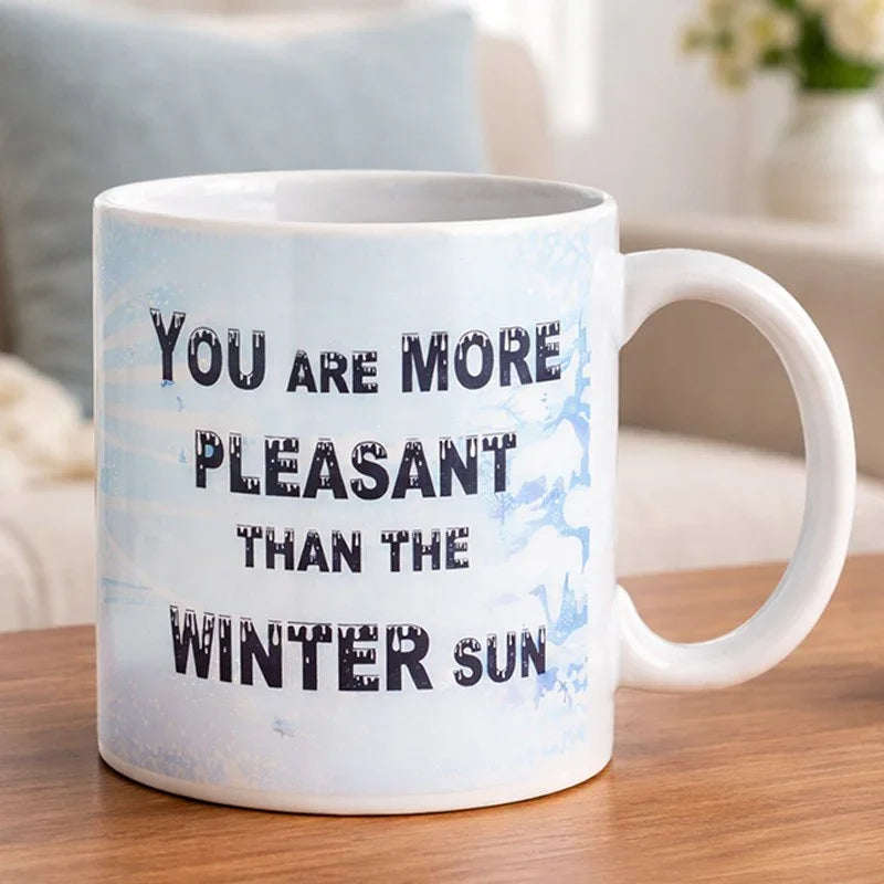 Mug with motivational quote on a wooden surface