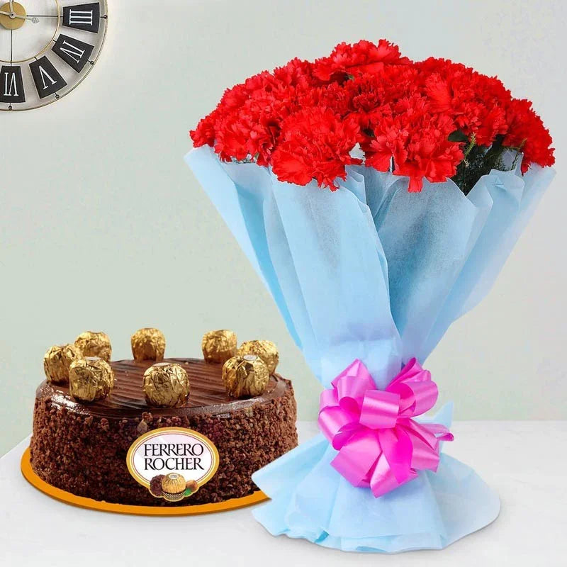 Bouquet of red flowers with a pink bow next to a Ferrero Rocher chocolate cake on a light gray background.