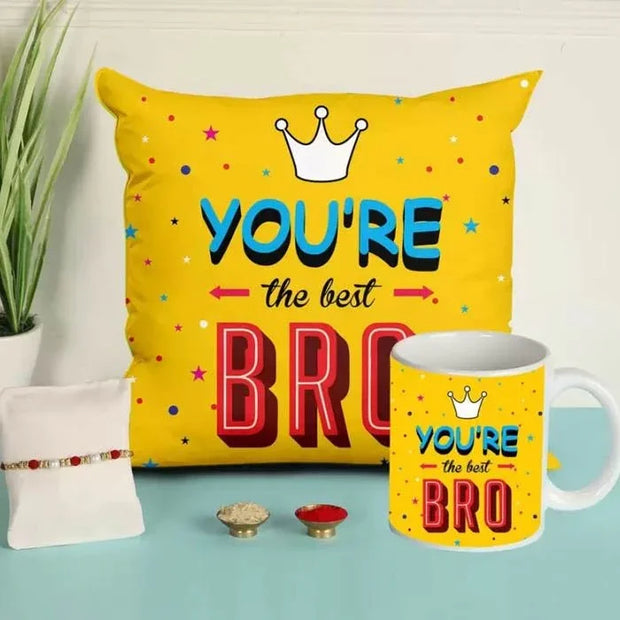 Yellow pillow and mug set with 'You're the best BRO' text on a light blue background.